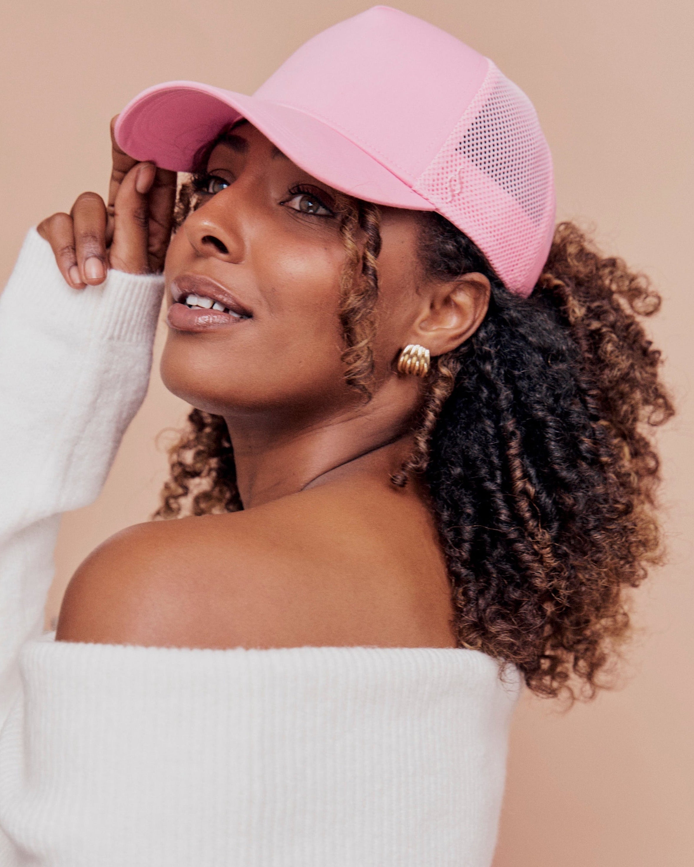 The Best Hats for Curly Hair (That Won’t Flatten Your Curls)